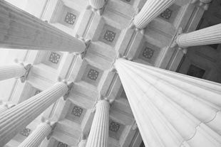 view of ceiling and columns