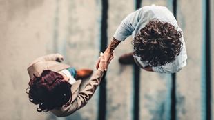 two people shaking hands