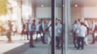 reflection of people in building outdoors