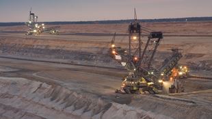 mining in desert at dusk